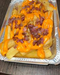 Papas cheddar y panceta